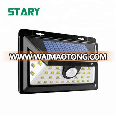 2018 hot sales 34 led outdoor solar powered garden motion sensor wall light waterproof